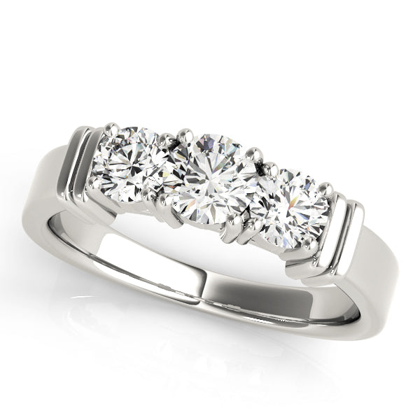 Round Three-Stone Diamond Engagement Ring · 0.24 ct tw