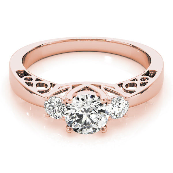 Round Three-Stone Diamond Engagement Ring · 0.70 ct tw