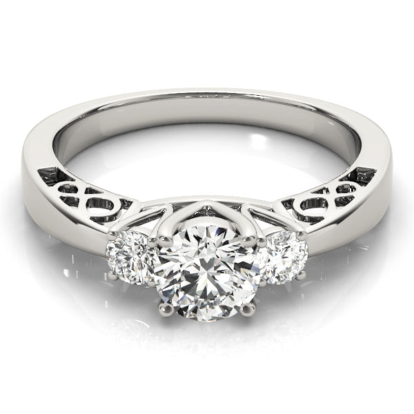 Round Three-Stone Diamond Engagement Ring · 0.70 ct tw