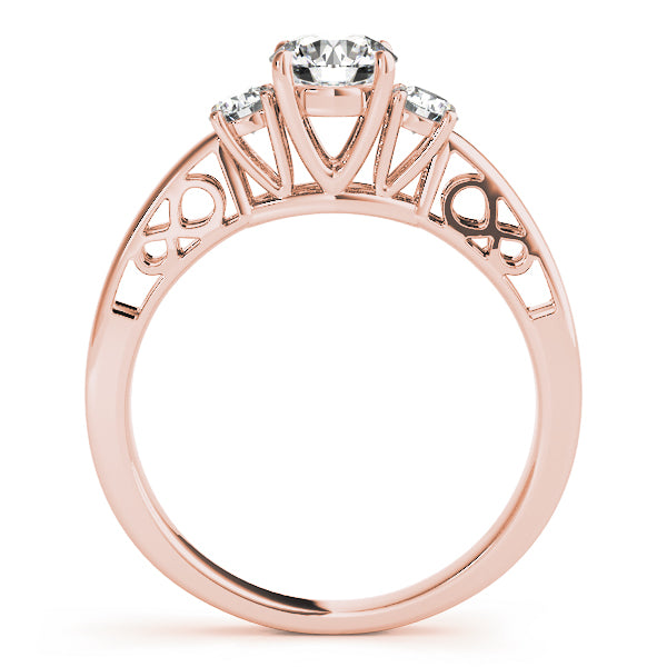 Round Three-Stone Diamond Engagement Ring · 0.70 ct tw