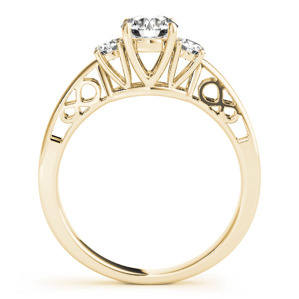 Round Three-Stone Diamond Engagement Ring · 0.70 ct tw