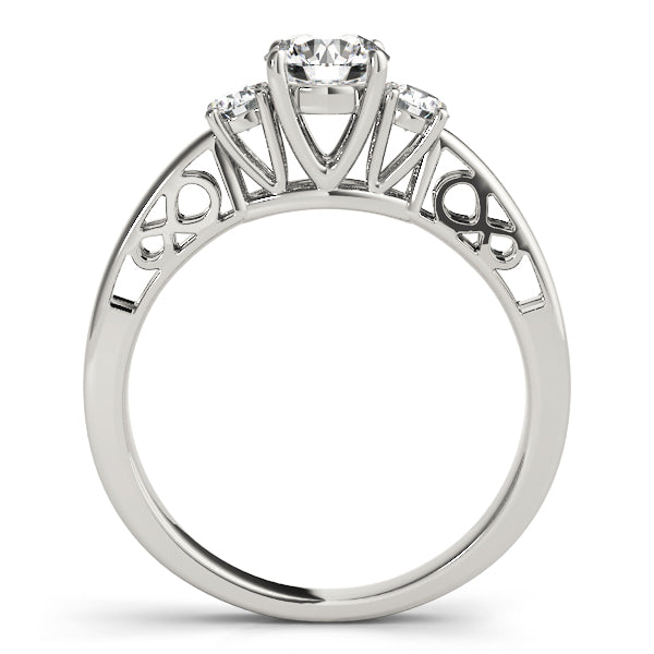 Round Three-Stone Diamond Engagement Ring · 0.70 ct tw
