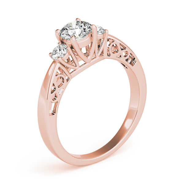 Round Three-Stone Diamond Engagement Ring · 0.70 ct tw
