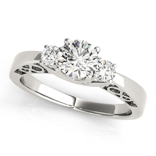Round Three-Stone Diamond Engagement Ring · 0.70 ct tw