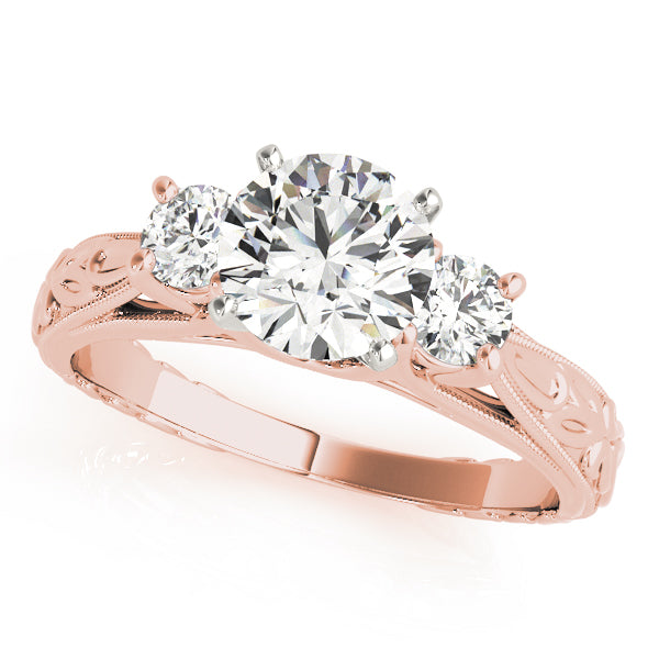 Round Three-Stone Diamond Engagement Ring · 0.30 ct tw