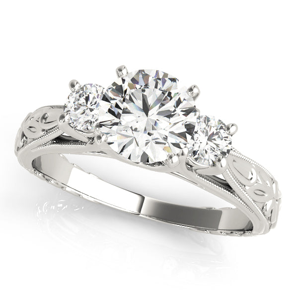 Round Three-Stone Diamond Engagement Ring · 0.30 ct tw