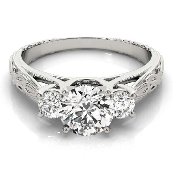 Round Three-Stone Diamond Engagement Ring · 0.30 ct tw