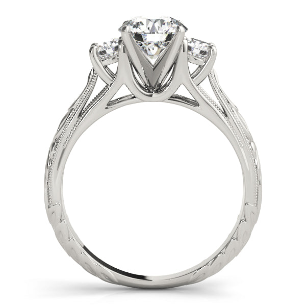 Round Three-Stone Diamond Engagement Ring · 0.30 ct tw