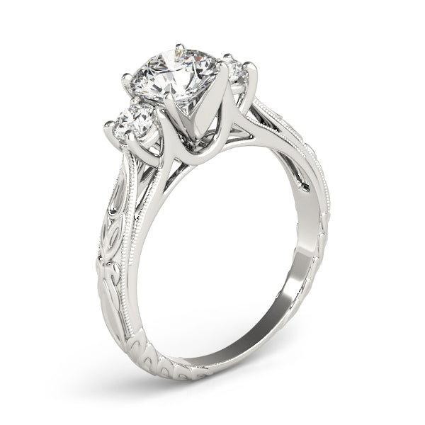 Round Three-Stone Diamond Engagement Ring · 0.30 ct tw