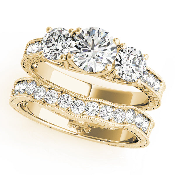 Round Three-Stone Diamond Engagement Ring · 1.08 ct tw