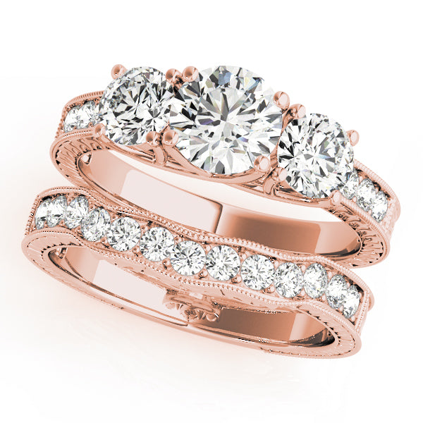 Round Three-Stone Diamond Engagement Ring · 1.08 ct tw