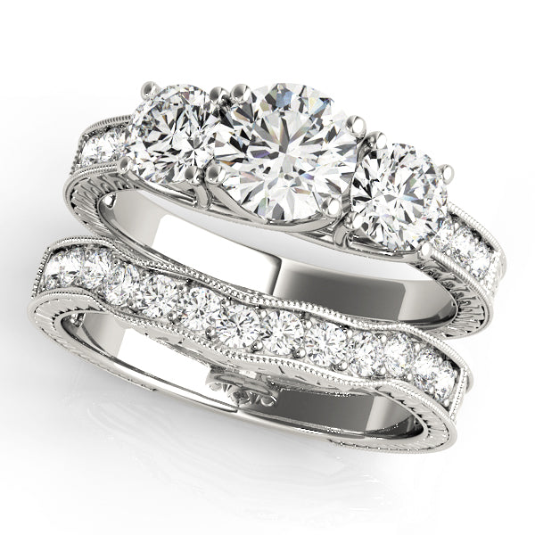 Round Three-Stone Diamond Engagement Ring · 2.37 ct tw