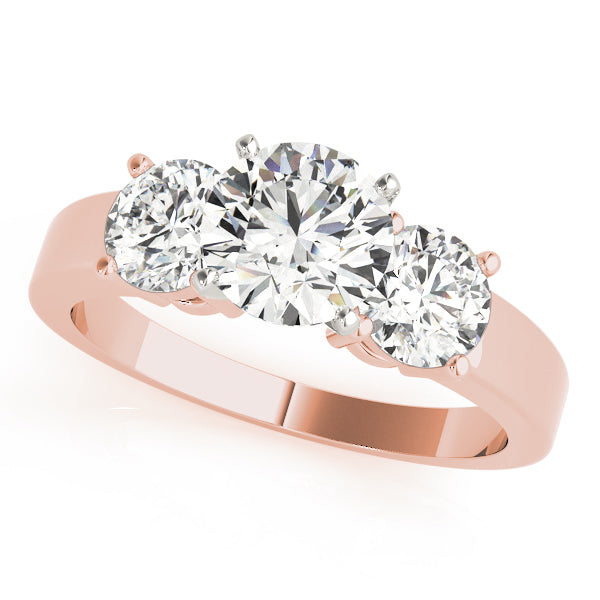 Round Three-Stone Diamond Engagement Ring · 0.32 ct tw