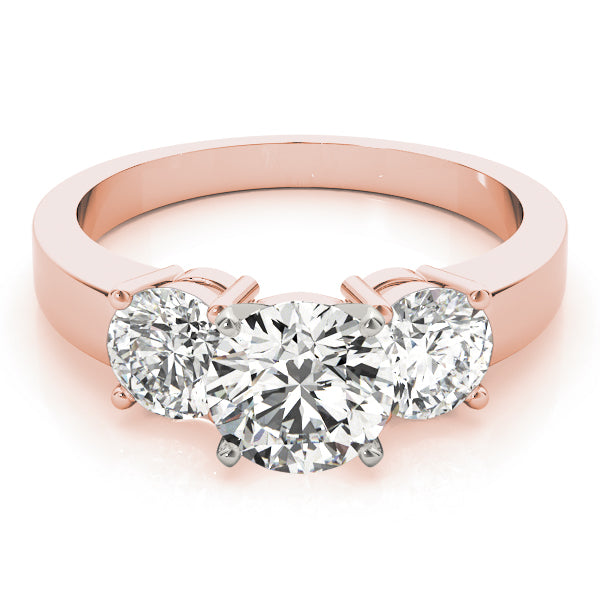 Round Three-Stone Diamond Engagement Ring · 0.24 ct tw
