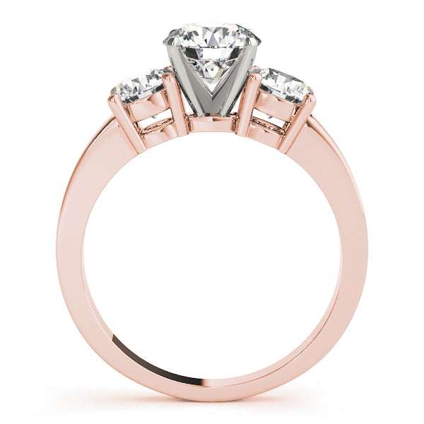 Round Three-Stone Diamond Engagement Ring · 0.24 ct tw