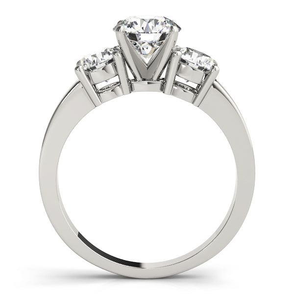 Round Three-Stone Diamond Engagement Ring · 0.24 ct tw