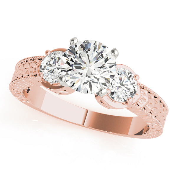 Round Three-Stone Diamond Engagement Ring · 0.50 ct tw