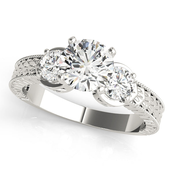 Round Three-Stone Diamond Engagement Ring · 0.50 ct tw