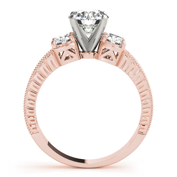 Round Three-Stone Diamond Engagement Ring · 0.40 ct tw