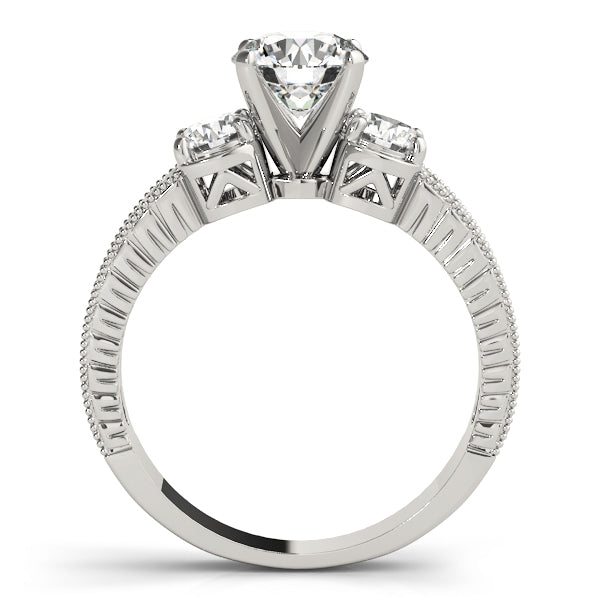 Round Three-Stone Diamond Engagement Ring · 0.24 ct tw