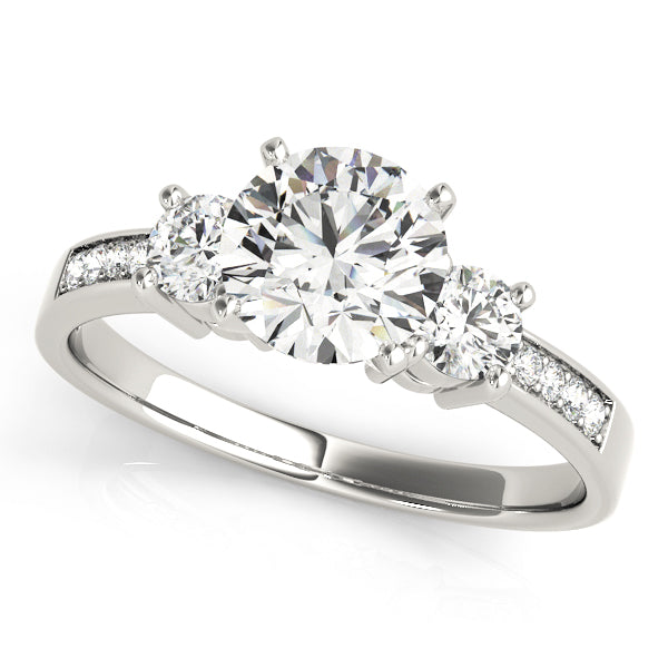 Round Three-Stone Diamond Engagement Ring · 0.40 ct tw