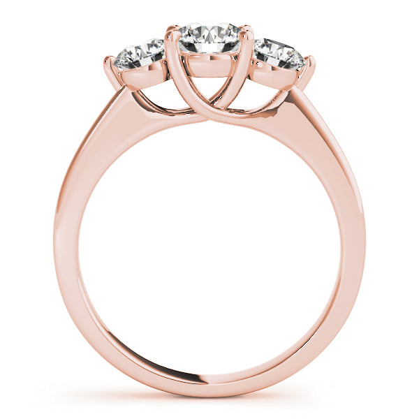 Round Three-Stone Diamond Engagement Ring · 0.49 ct tw