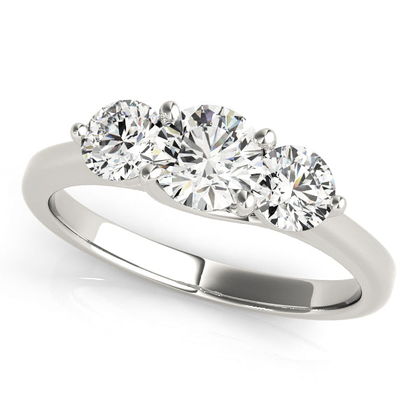 Round Three-Stone Diamond Engagement Ring · 0.49 ct tw