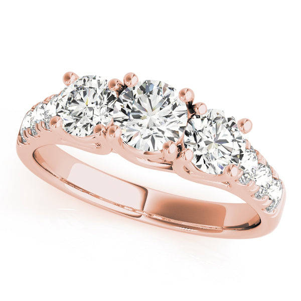 Round Three-Stone Diamond Ring · 0.74 ct tw