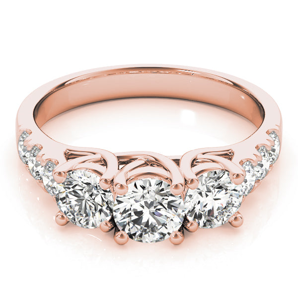 Round Three-Stone Diamond Ring · 0.74 ct tw