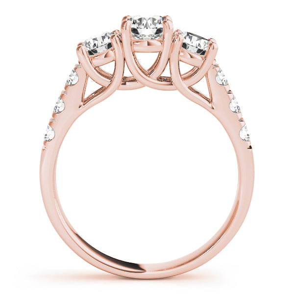 Round Three-Stone Diamond Ring · 0.74 ct tw