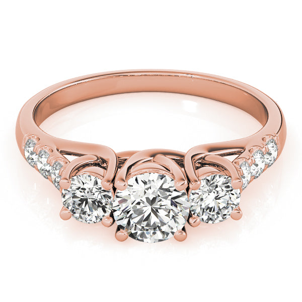 Round Three-Stone Diamond Engagement Ring · 0.49 ct tw
