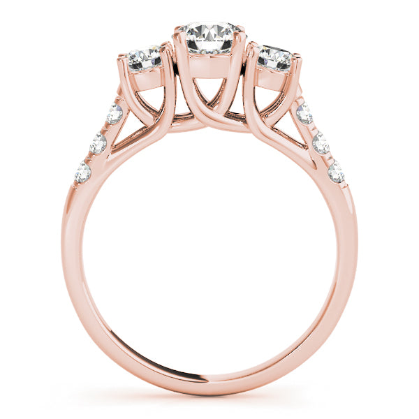 Round Three-Stone Diamond Engagement Ring · 0.49 ct tw