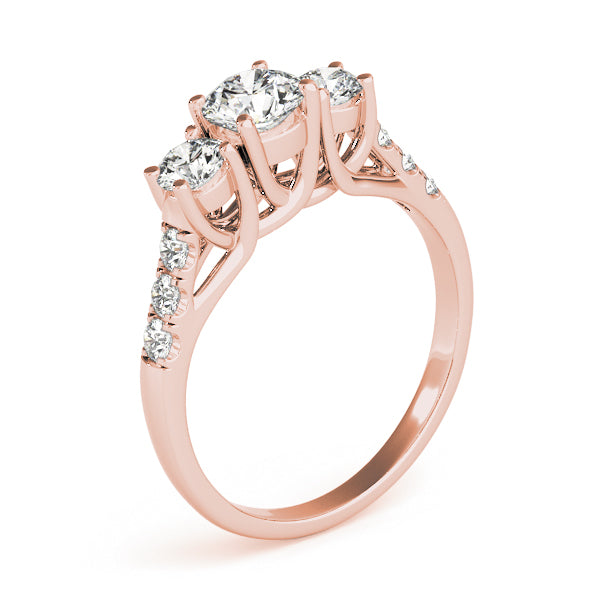 Round Three-Stone Diamond Engagement Ring · 0.49 ct tw