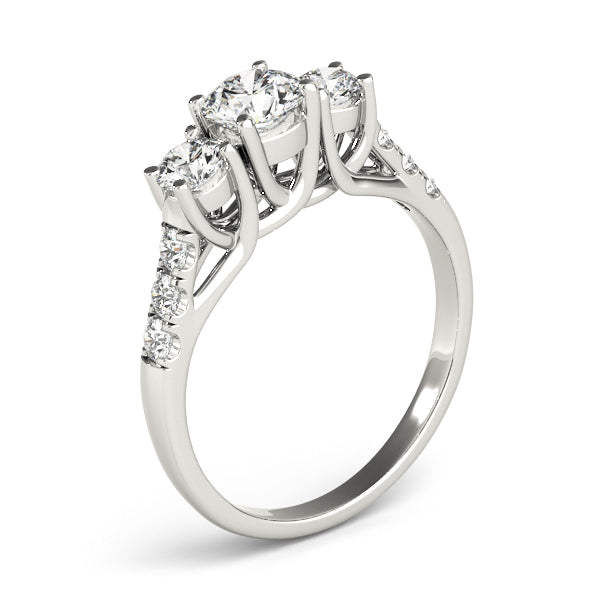 Round Three-Stone Diamond Engagement Ring · 0.49 ct tw