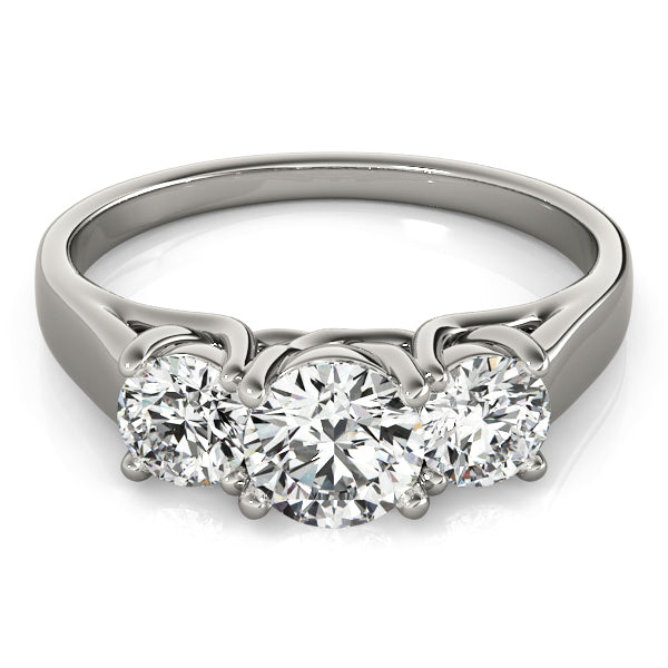 Round Three-Stone Diamond Engagement Ring · 0.49 ct tw