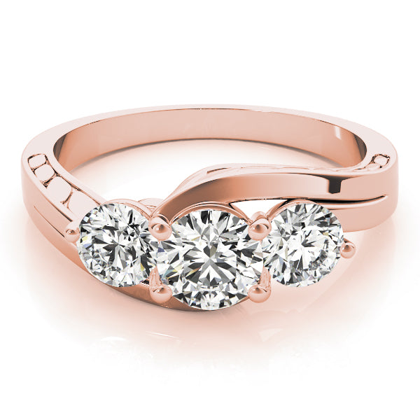 Round Three-Stone Diamond Engagement Ring · 0.24 ct tw
