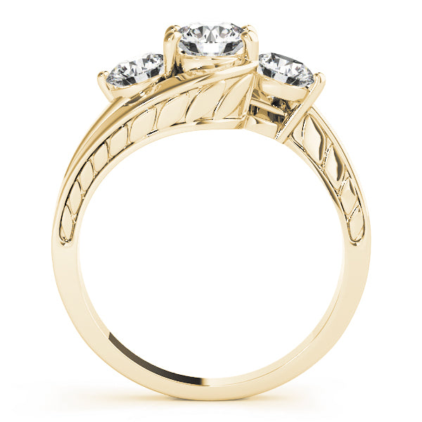 Round Three-Stone Diamond Engagement Ring · 0.24 ct tw