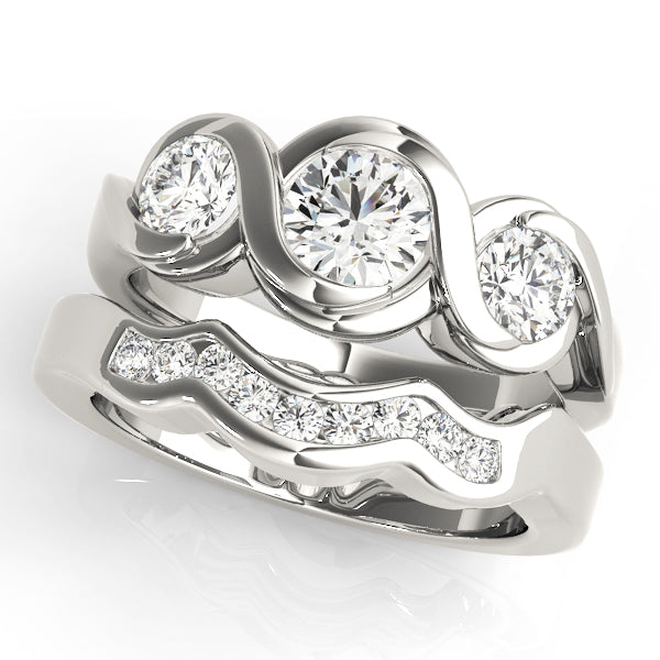 Round Three-Stone Diamond Engagement Ring · 1.00 ct tw