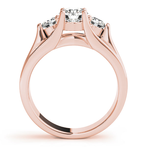 Round Three-Stone Diamond Engagement Ring · 1.01 ct tw