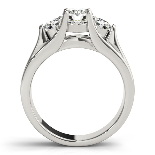 Round Three-Stone Diamond Engagement Ring · 0.24 ct tw