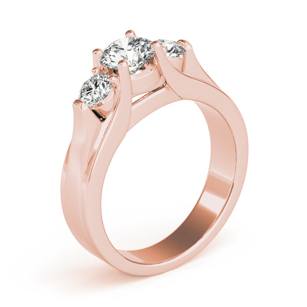 Round Three-Stone Diamond Engagement Ring · 0.24 ct tw