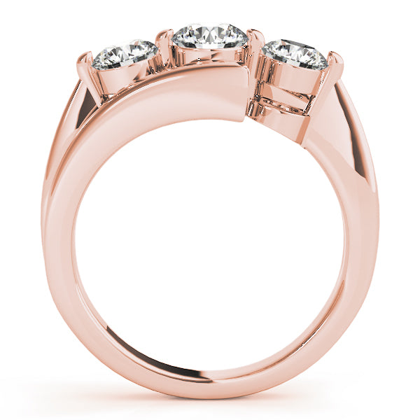 Round Three-Stone Diamond Engagement Ring · 0.49 ct tw