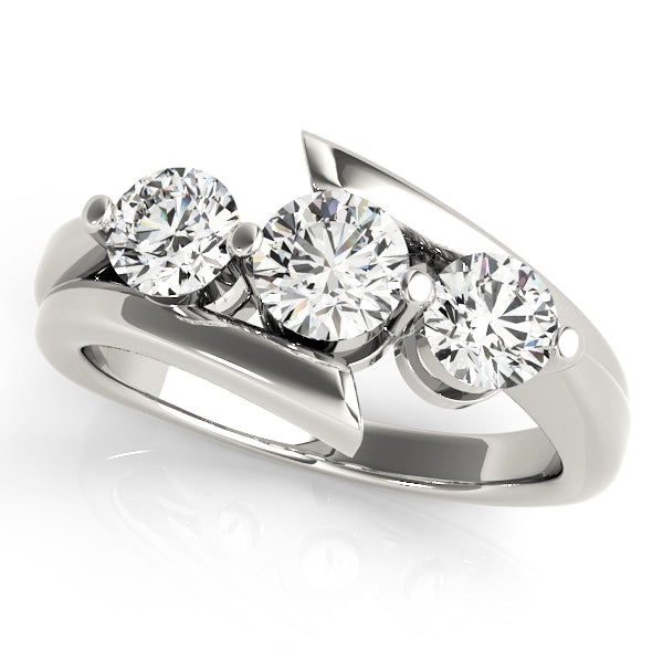 Round Three-Stone Diamond Engagement Ring · 0.24 ct tw