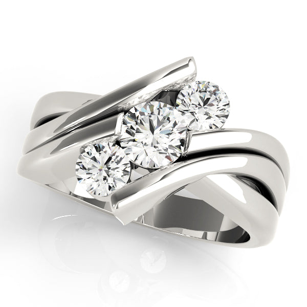 Round Three-Stone Diamond Engagement Ring · 0.24 ct tw
