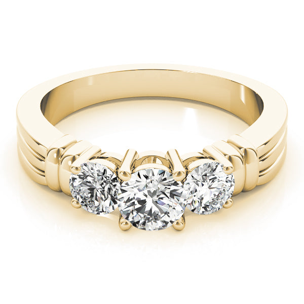 Round Three-Stone Diamond Engagement Ring · 0.24 ct tw