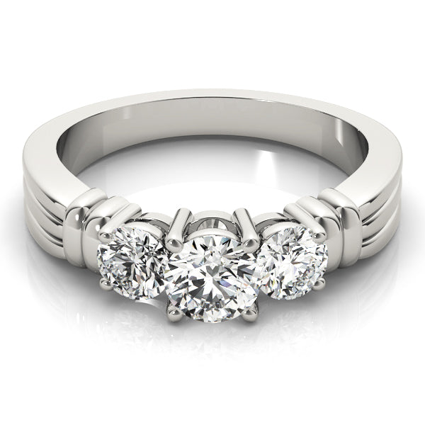 Round Three-Stone Diamond Engagement Ring · 0.50 ct tw