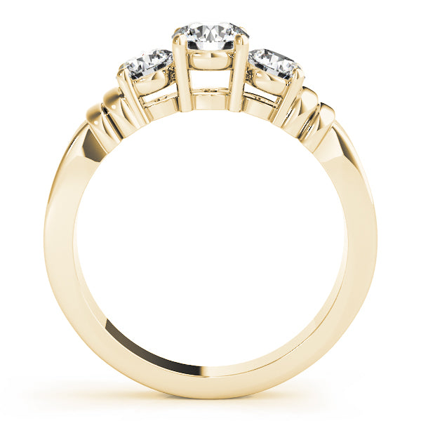 Round Three-Stone Diamond Engagement Ring · 0.24 ct tw