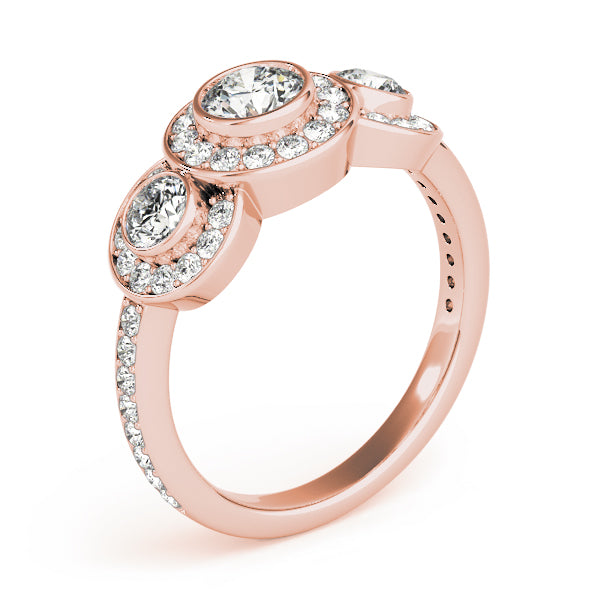 Round Three-Stone Diamond Engagement Ring · 0.97 ct tw