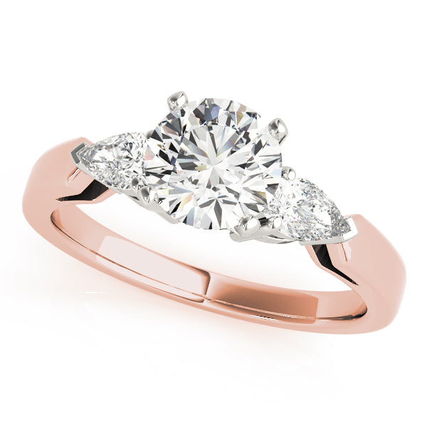 Pear Three-Stone Diamond Engagement Ring · 0.14 ct tw