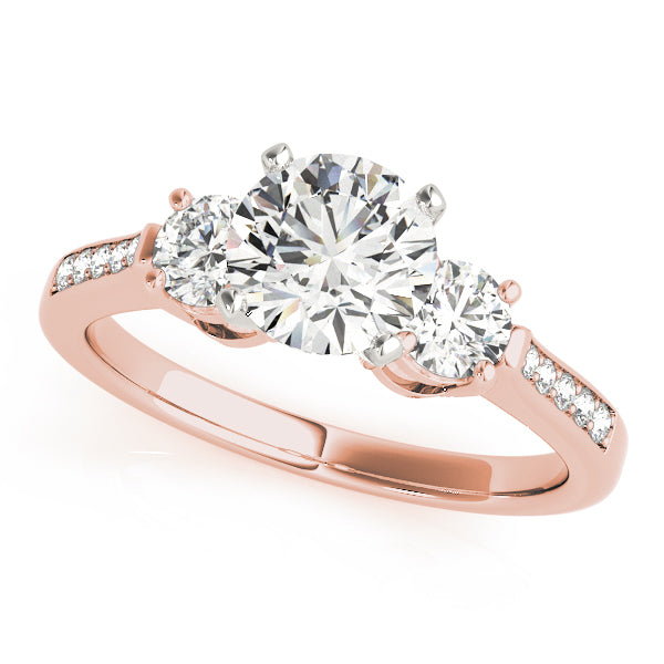 Round Three-Stone Diamond Engagement Ring · 0.34 ct tw